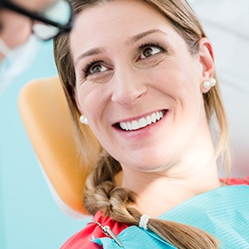 woman smiling right at dentist