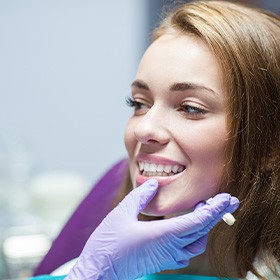 a dental patient smiling during an appointment