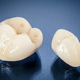 a close-up of two dental crowns