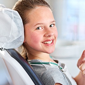 young girl smiling at camera