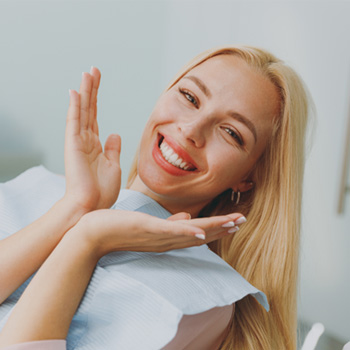 a dental patient smiling confidently 