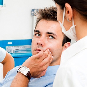 man with toothache
