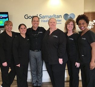 Lawrenceville dentist and dental team members at Good Samaritan Health Center