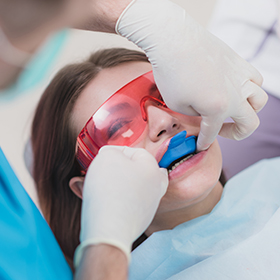 woman getting fluoride treatment