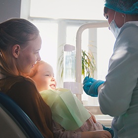 young child getting checkup