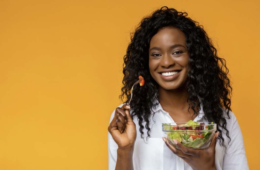 woman eating salad 