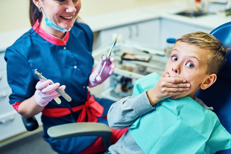 boy afraid of dentist in Lawrenceville