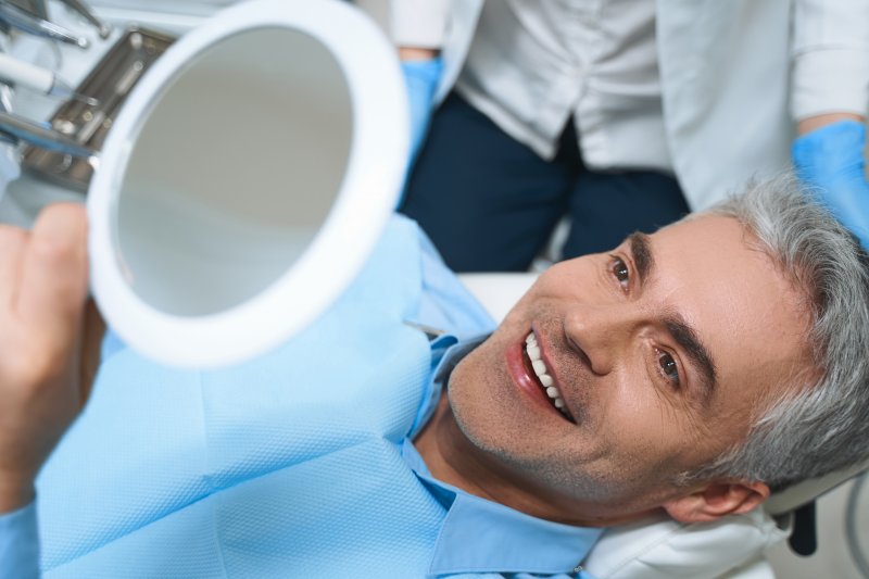 Happy man after veneer procedure.