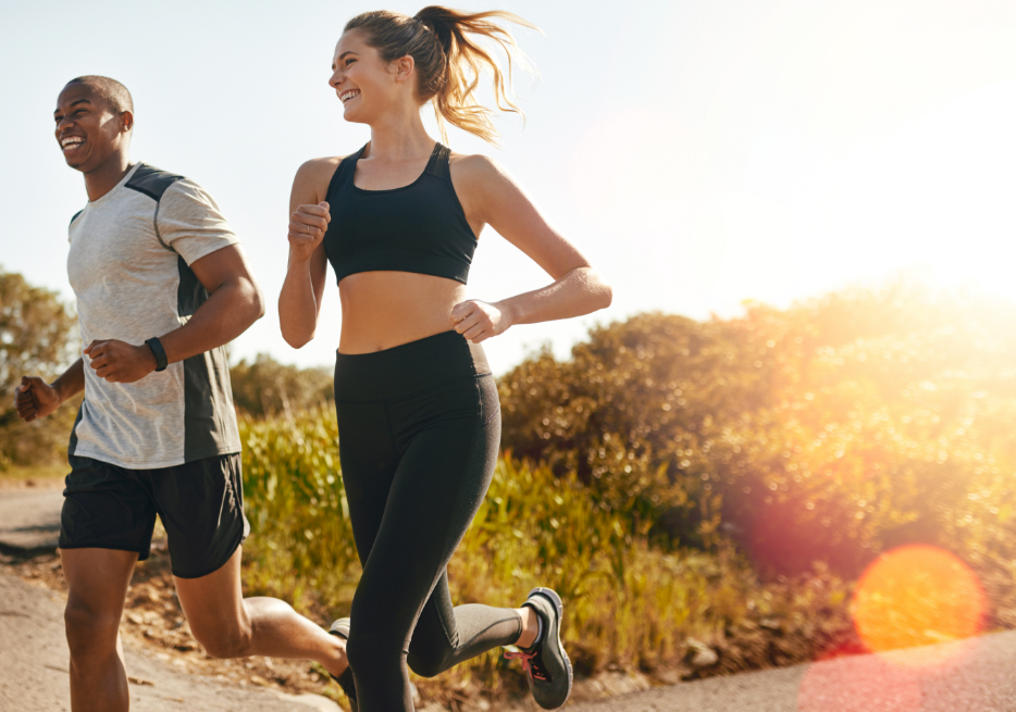 Two joggers running in nature