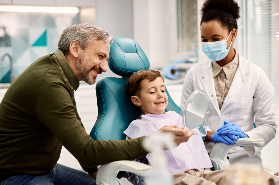Father and son at dentist