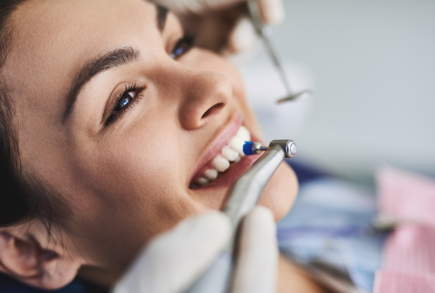 Woman getting teeth cleaned